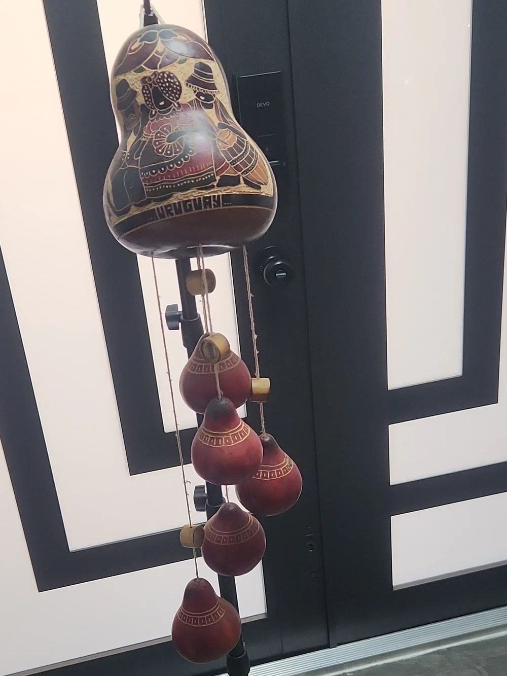 Handcrafted In Urugway Red Gourd Wall Hanging